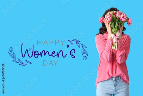 Young woman with bouquet of...