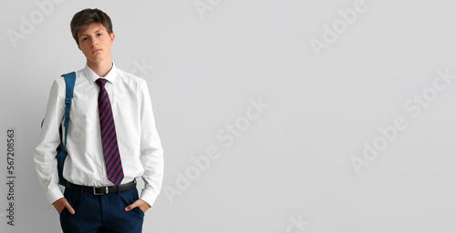 Teenage boy with backpack o...