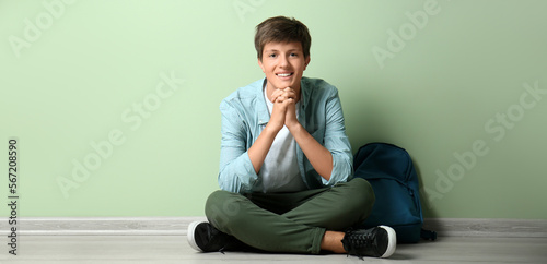 Teenage boy with backpack s...