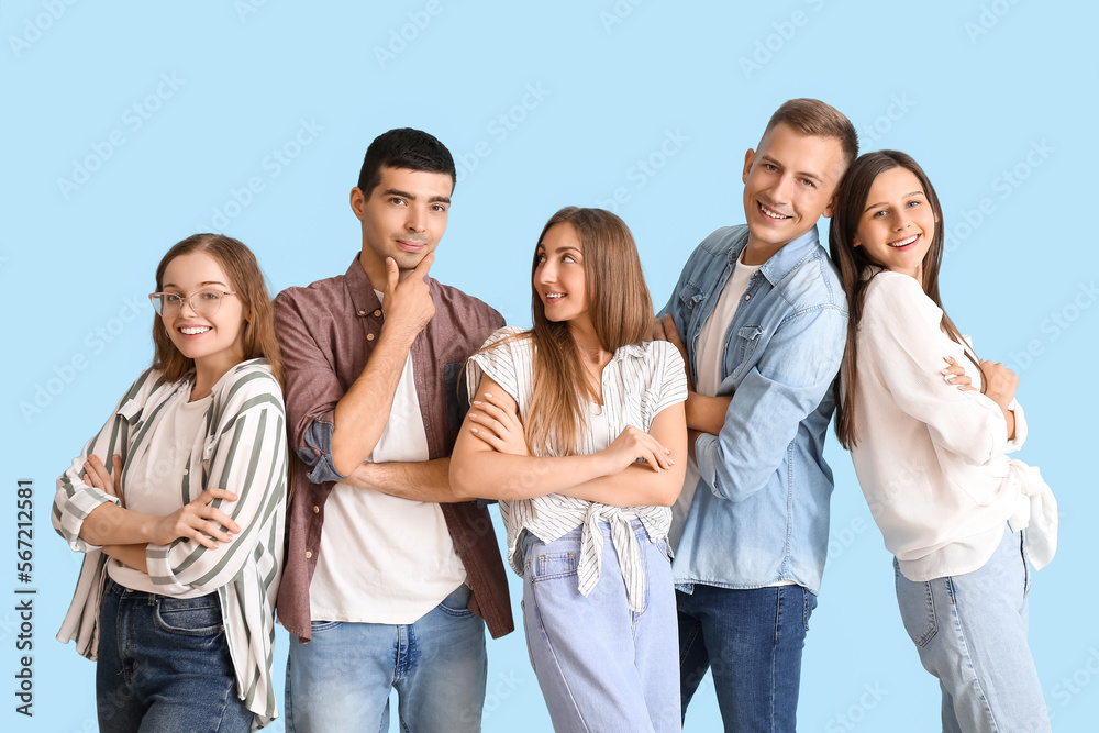 Group of happy friends on blue background Group of happy friends on blue background