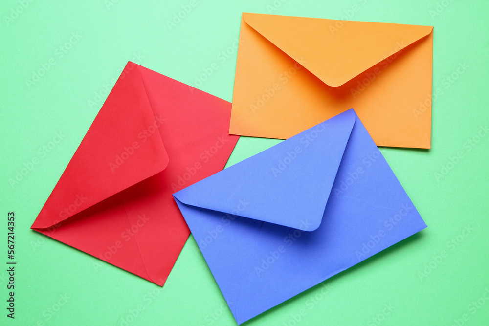 Different paper envelopes on color background, closeup Different paper envelopes on color background, closeup