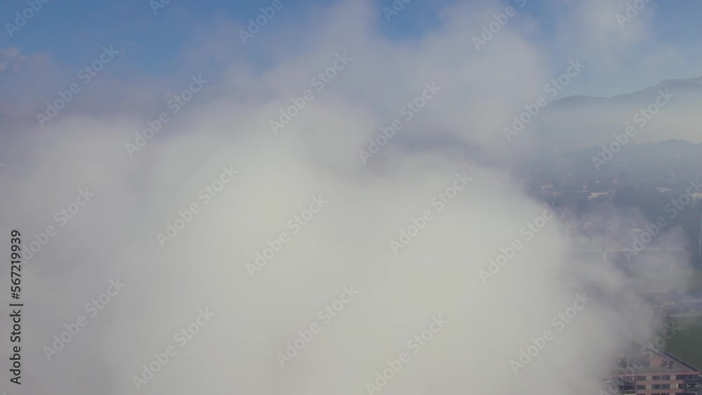 Flying through a smoke revealing polluted city Flying through a smoke revealing polluted city