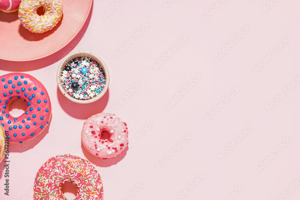 Tasty glazed donuts on pink background, closeup Tasty glazed donuts on pink background, closeup