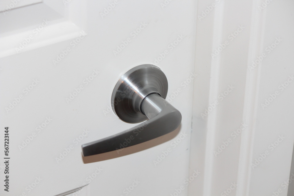 A closeup isolated photo of a simple door handle A closeup isolated photo of a simple door handle