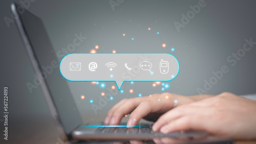 Customer or contact us connecting network  support hotline  people connection. Hand's businessman using  laptop with the email, call phone, address, Chat message icons. application service support.