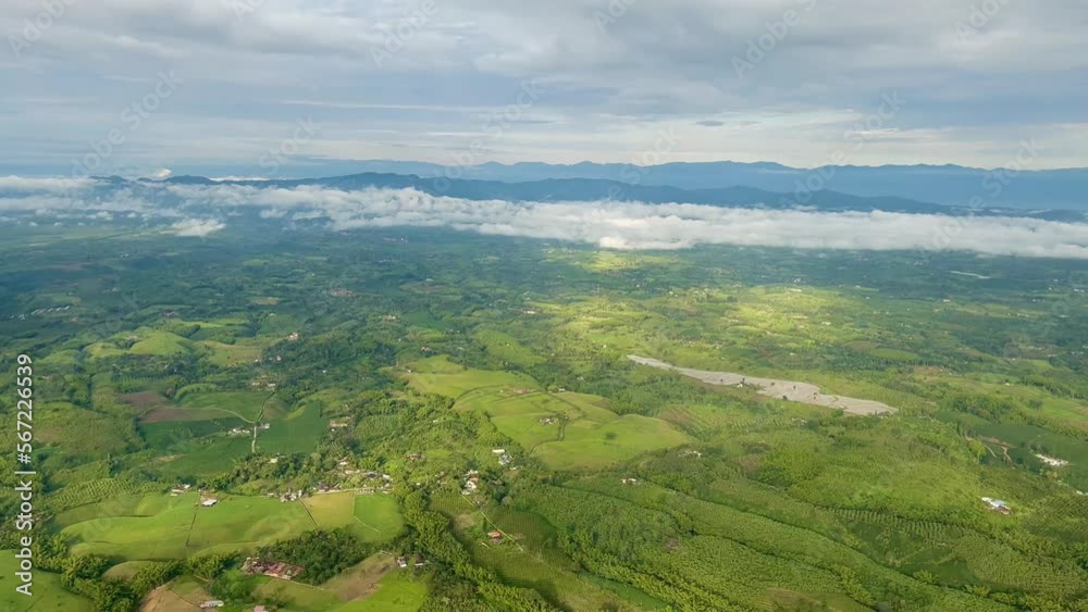A view from a plane over Armenia, Colombia in the morning as the elevation declines A view from a plane over Armenia, Colombia in the morning as the elevation declines