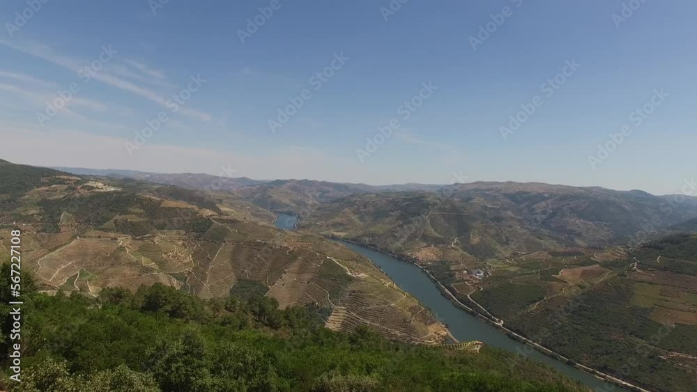 Discovering Beautiful Nature Landscape. The Douro River Crossing Mountains Discovering Beautiful Nature Landscape. The Douro River Crossing Mountains