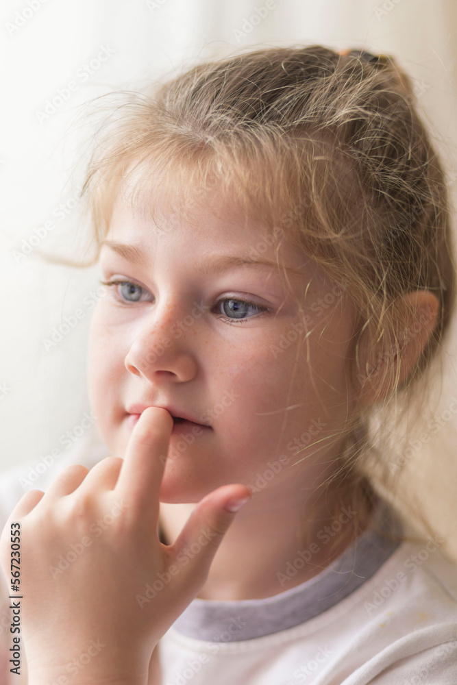 portrait of a beautiful emotional blonde girl in her room portrait of a beautiful emotional blonde girl in her room