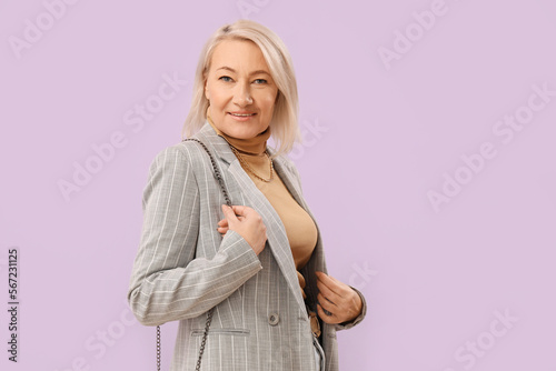 Stylish blonde mature woman...