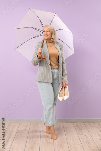 Barefoot mature woman with ...