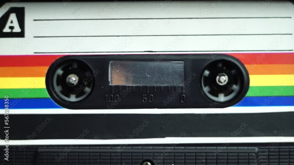 Audio Cassette Tape. Close Up of Vintage Recording Spinning in Player