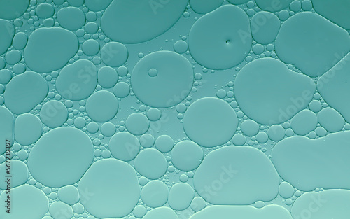 Oil and water bubbles of an art image on blue green gradient background. Ideal as app design background, template, all season sale poster etc.,.