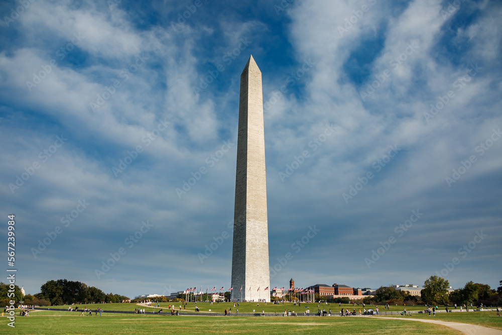 Obraz premium The Washington Monument, a memorial to first US President and Founding Father George Washington, located on the National Mall in Washington, DC
