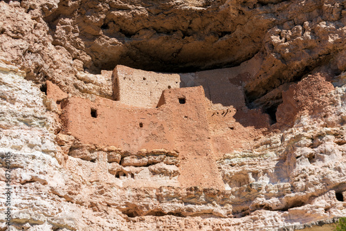 Montezuma Castle old rock dwellings up a sheer limestone cliff. Ancient well preserved Native American cliff dwelling in side of limestone mountain
