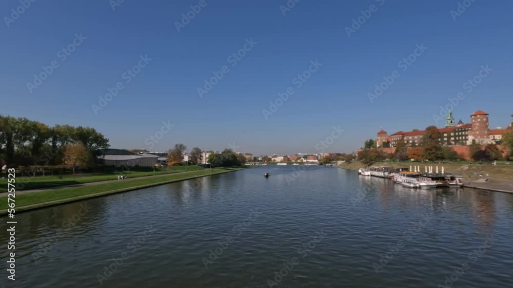 The Vistula River flowing through the middle of the city of Krakow - Poland The Vistula River flowing through the middle of the city of Krakow - Poland