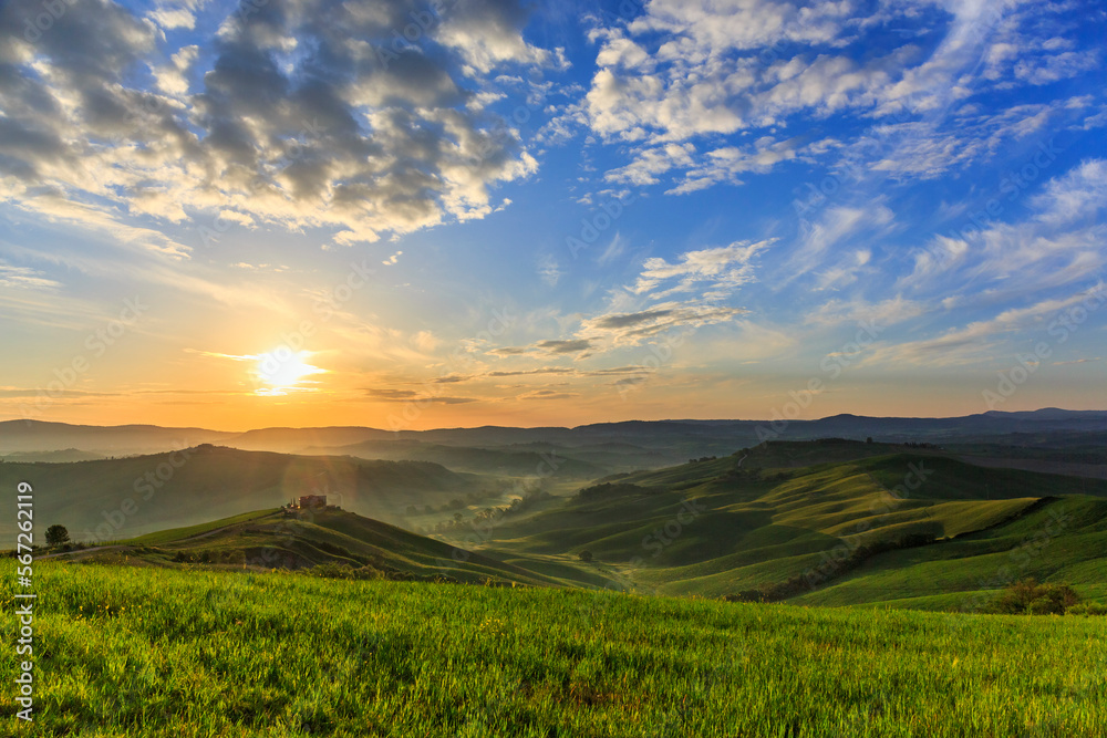 Sunrise in Tuscan with rolling rural landscape
