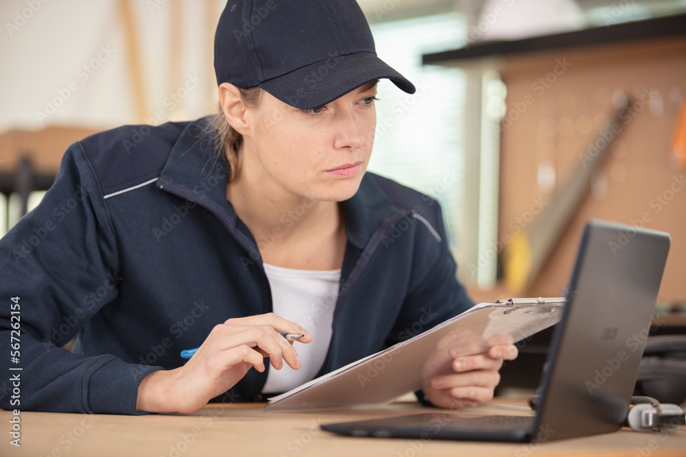 young woman repairing electronic equipment young woman repairing electronic equipment