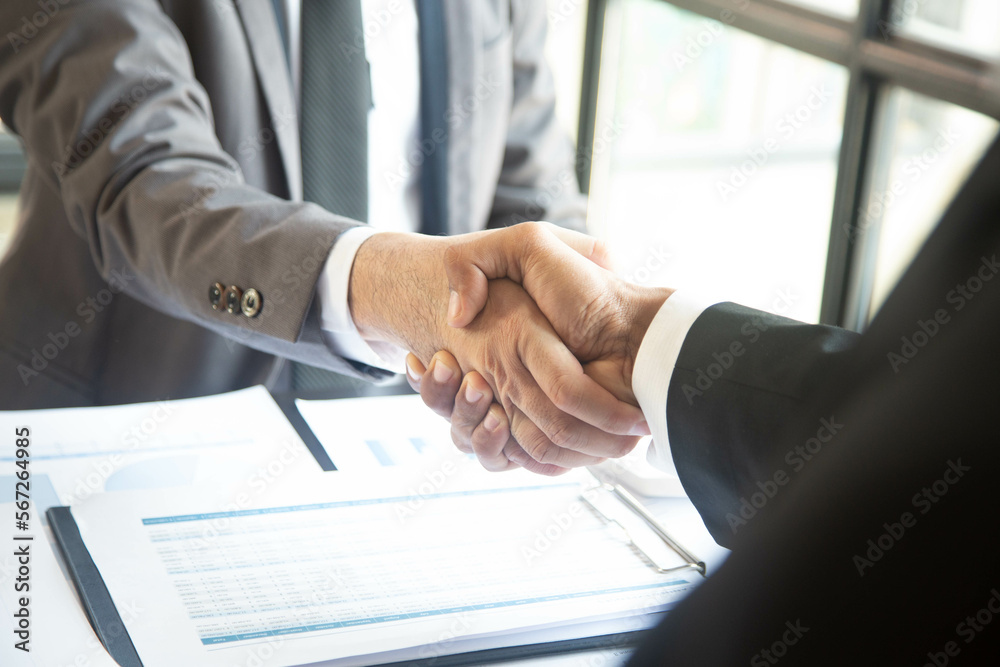businessman handshake agreement for consult preparing the phrase to be used in the trial.concept of business