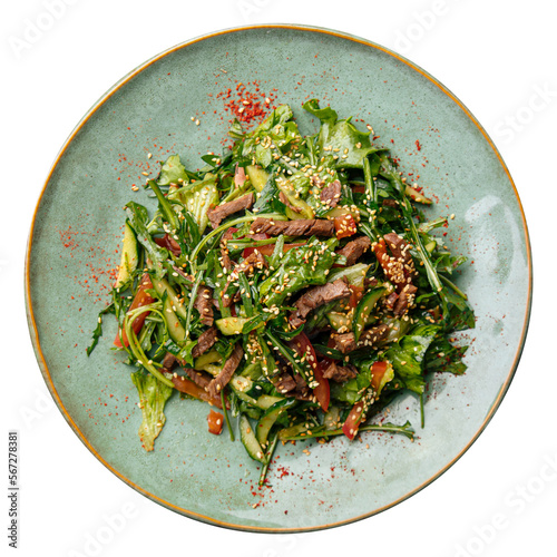 Portion of veal salad with greens and teriyaki