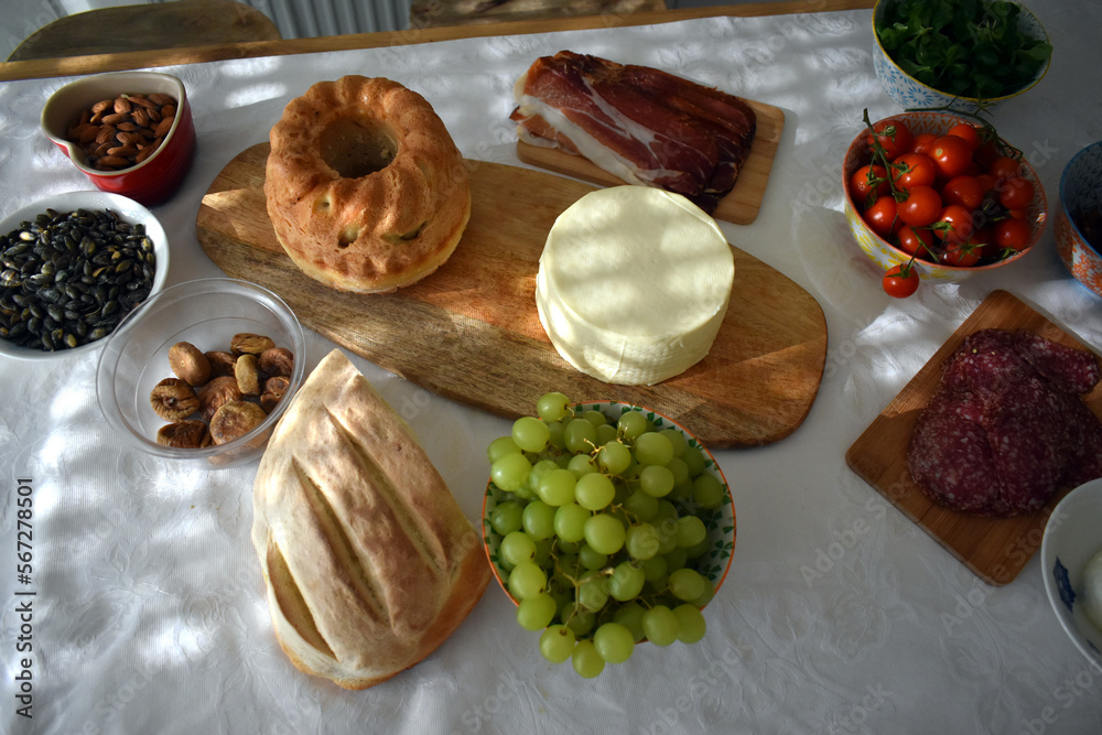Various food on the table, ingredients, dried meat, cheese.