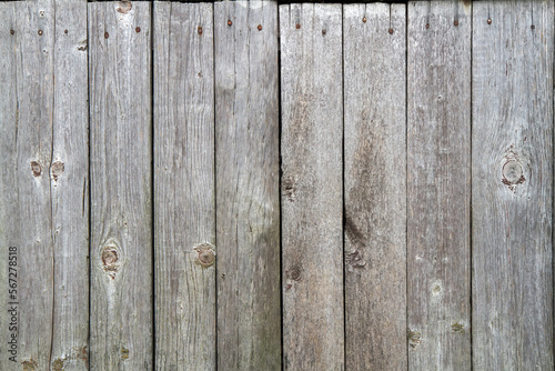 Background texture of old wooden boards. Grey wooden planks.