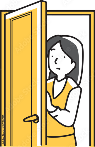 扉から覗く女性