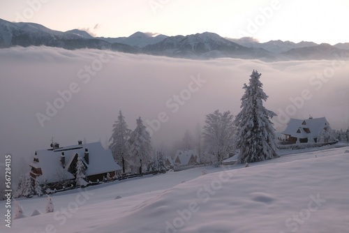 Winter scenery of panorama of Tatras Mountains and Zakopane buildings from Gubalowka hill in Zakopane, Podhale, Poland