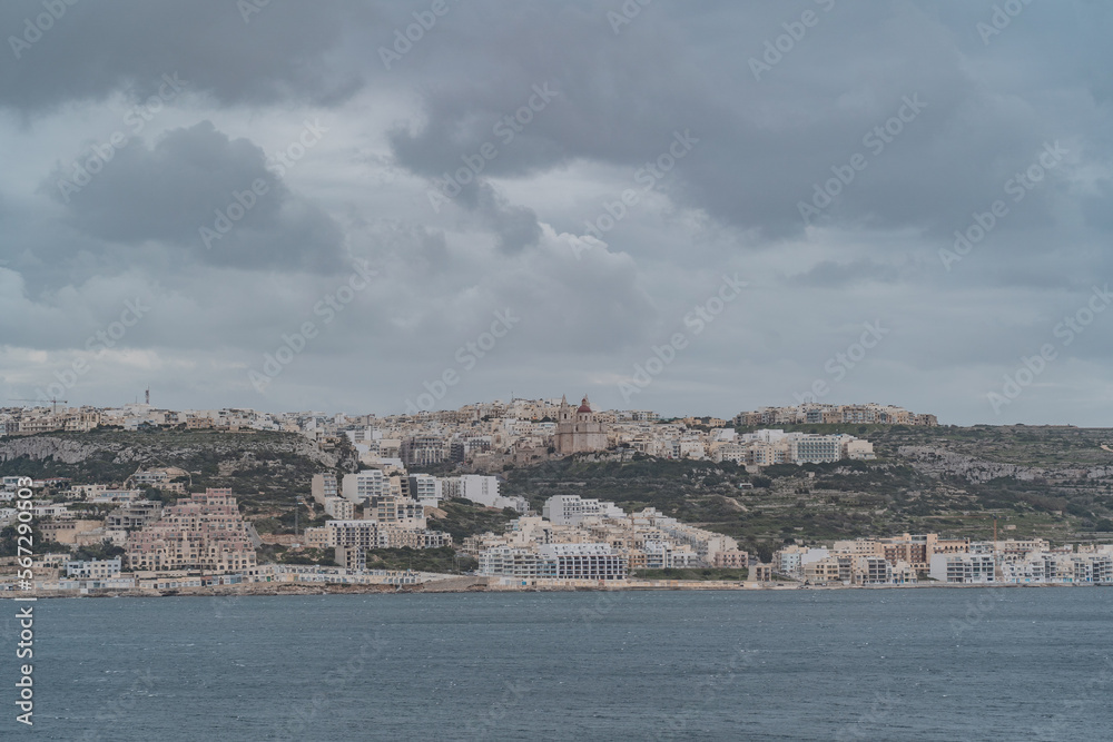 View over the sea and the Northern city Mellieha in Malta. 