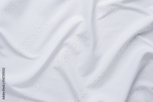 White fabric. luxurious white fabric texture background. Creases of satin, silk and cotton. 