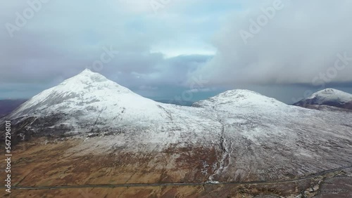 The snow covered Aghla close to Mount Errigal in County Donegal - Ireland photo