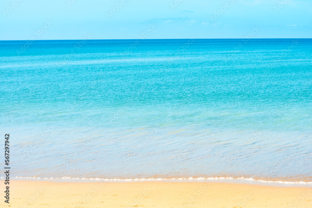 Summer vacation sea nature background. Blue sea water and sand beach