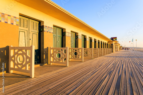 The famous beach cabins of the promenade des Planches in Deauville. Normandy, France. photo