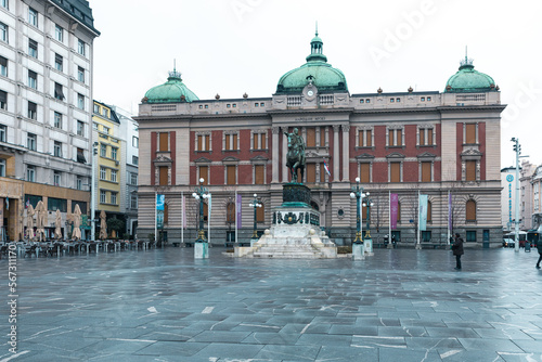 The Republic Square (Trg Republike in Serbian) with old Baroque style buildings, the statue of Prince Michael and the National Museum. photo