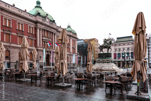 The Republic Square (Trg Republike in Serbian) with old Baroque style buildings, the statue of Prince Michael and the National Museum. photo