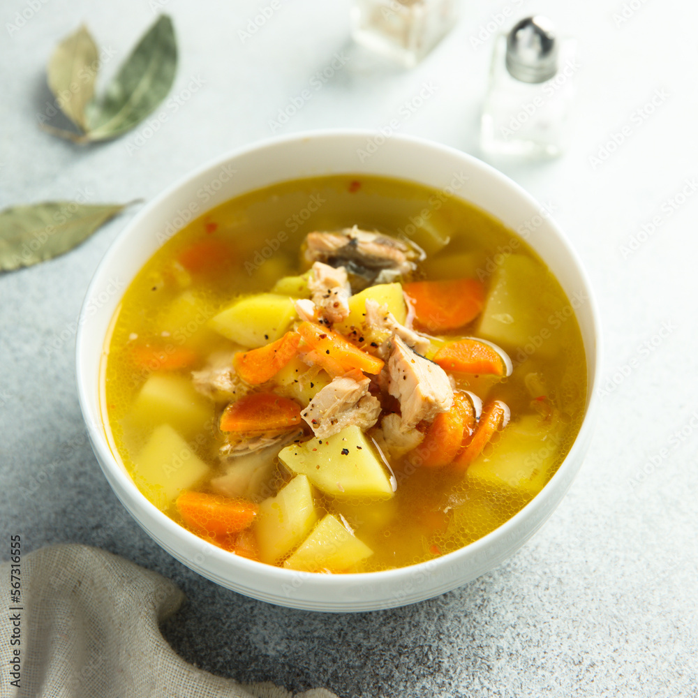 Traditional homemade fish soup with vegetables Traditional homemade fish soup with vegetables