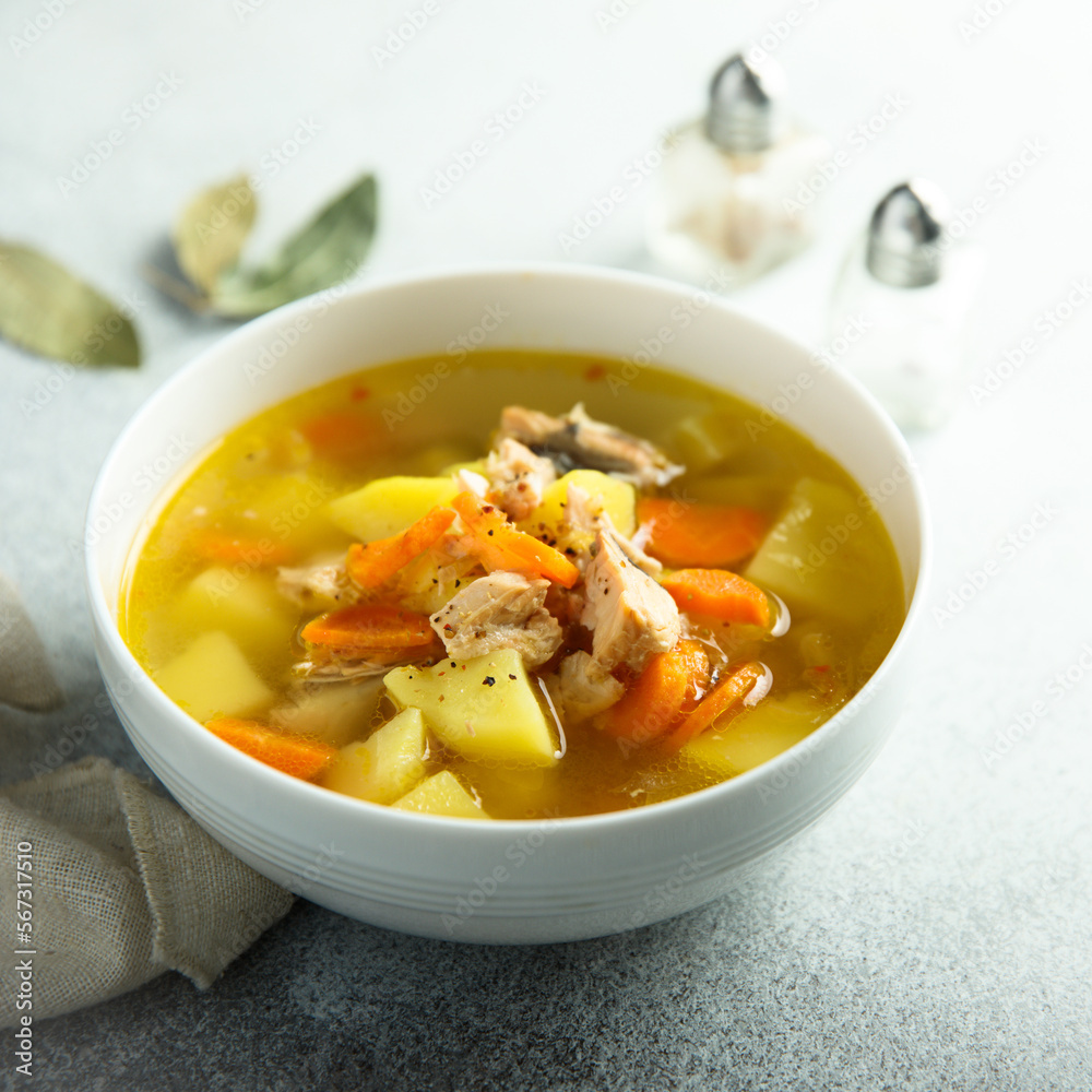Traditional homemade fish soup with vegetables Traditional homemade fish soup with vegetables