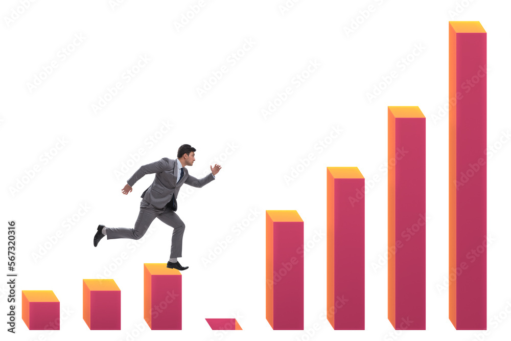 Businessman in growth concept with bar charts Businessman in growth concept with bar charts