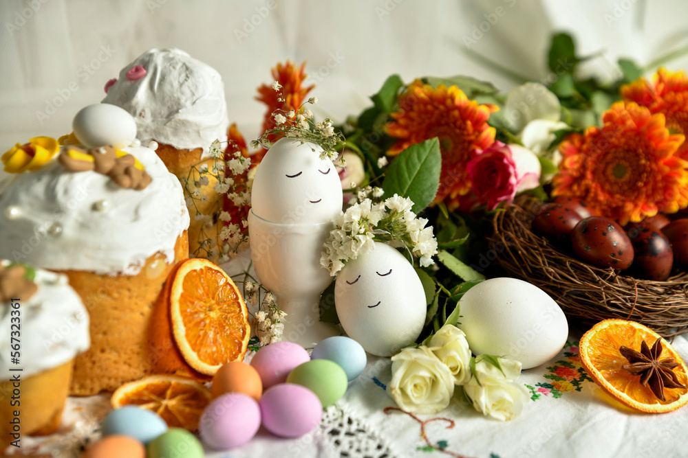 Easter and Easter eggs with flowers on the table Easter and Easter eggs with flowers on the table