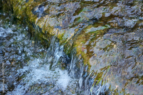Scenery of a small stream waterfall in the mountain.