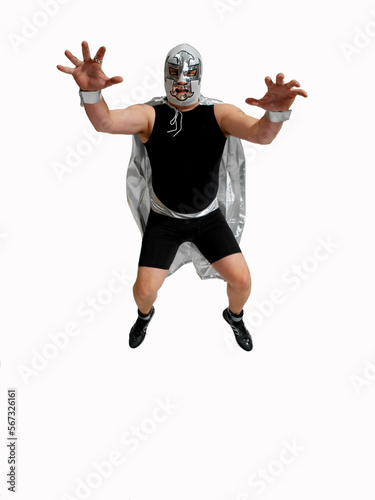 A Mexican wrestler makes an intimidating pose.