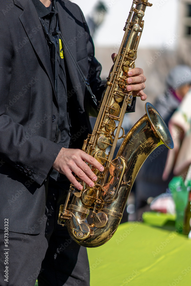 Obraz premium Street music band performing at a outdoor festival