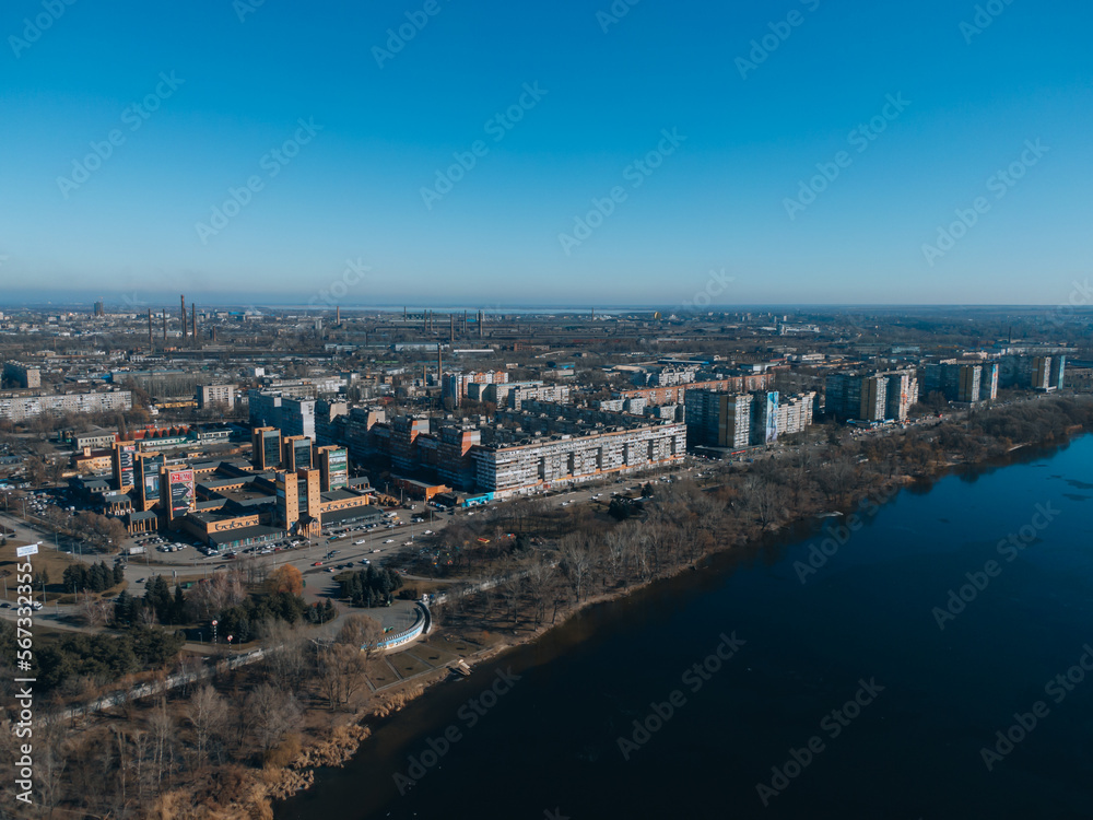 Top view of the left bank. Solnechny district, Dnipro, Ukraine. Residential houses, sleeping area. Panoramic view. Ukrainian city before the war.