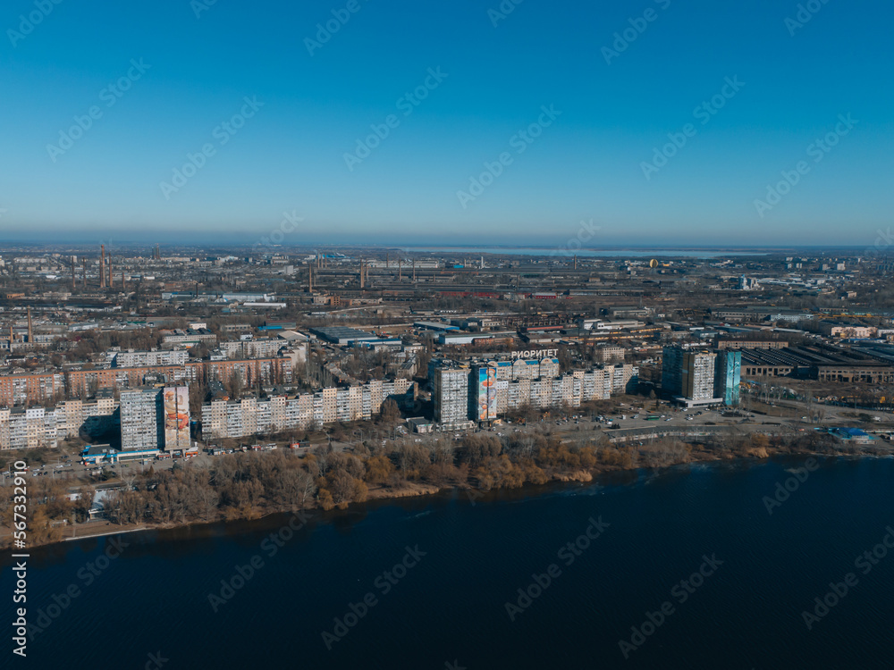 Top view of the left bank. Solnechny district, Dnipro, Ukraine. Residential houses, sleeping area. Panoramic view. Ukrainian city before the war.