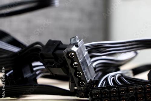 Closeup of Molex power cable isolated on blurred background © kanurism