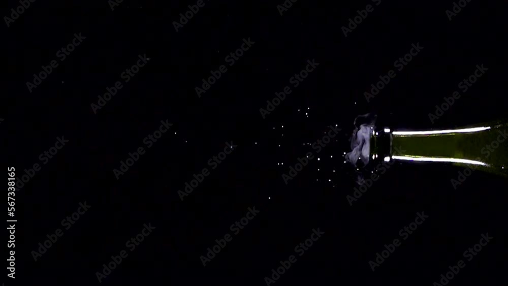 Super slow motion shot of champagne explosion, opening champagne bottle closeup. Filmed on high speed cinema camera, 4k1000fps
