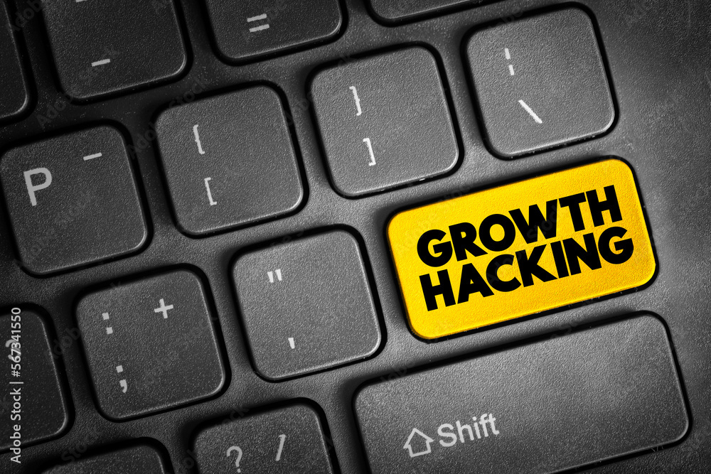 Fototapeta premium Growth Hacking - subfield of marketing focused on the rapid growth of a company, text button on keyboard