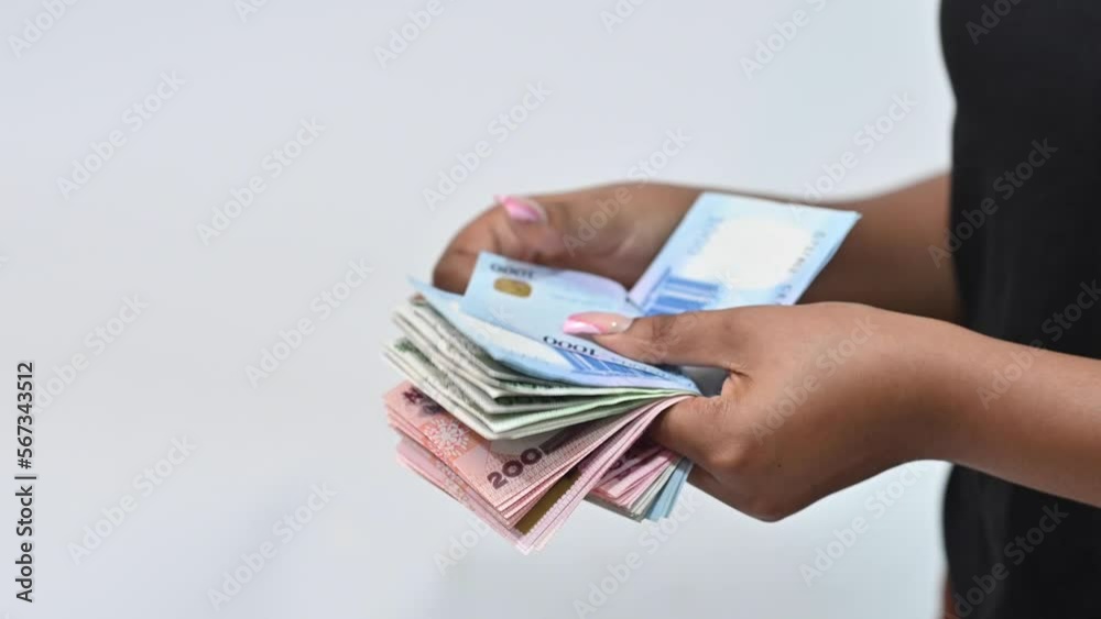 Close up young african woman hands counting money money. the new naira note 