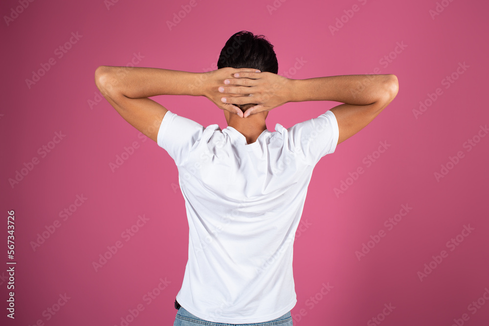 A man from behind gesticulates with his hands. A man from behind gesticulates with his hands.