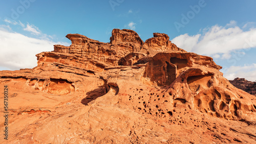 Red orange sandstone rocks formations in Wadi Rum (also known as Valley of the Moon) desert, Jordan