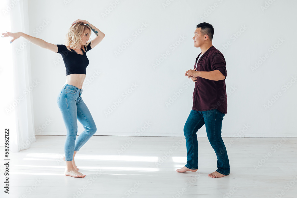 Fototapeta premium pair dance latin training loving dancers training in bachata kizomba dance hall